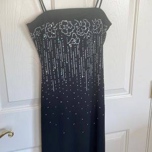 NWT Black formal evening gown with spaghetti straps and embroidered design